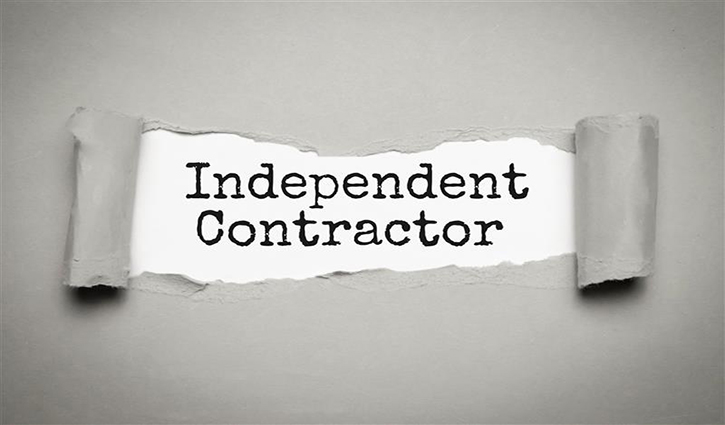 Torn gray paper reveals the words Independent Contractor in black typewriter font. The text, framed by curled edges, hints at the DOLs Final Rule on work classification. The background is a smooth gray.