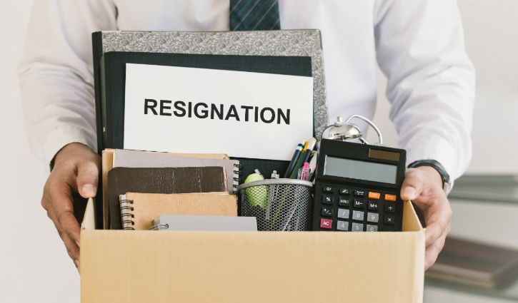 The Best Benefits Offerings to Avoid the Great Resignation 2 Resignation. businessmen holding boxes for personal belongings and resignation letters.Quitting a job,The big quit.The great Resignation.
