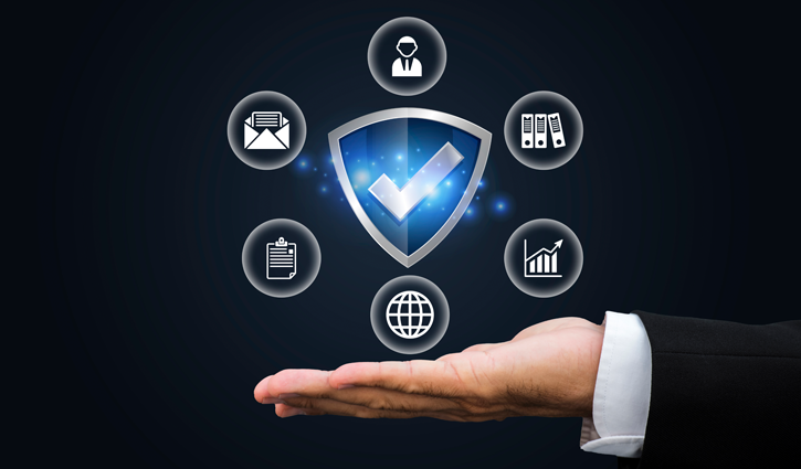 A hand supports a floating digital graphic of a shield with a checkmark, surrounded by icons: email, person, files, clipboard, bar chart, and globe on a dark background symbolizing security and data management—safeguarding against cyber risks and liabilities.